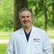 Dr. Justin M. Tenney