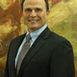 Dr. John L. Couvaras