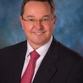 Dr. Craig E. Harrison